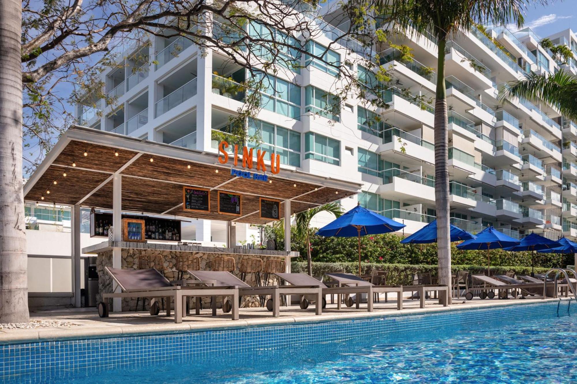 Santa Marta Marriott Resort Playa Dormida Kültér fotó The swimming pool at the hotel